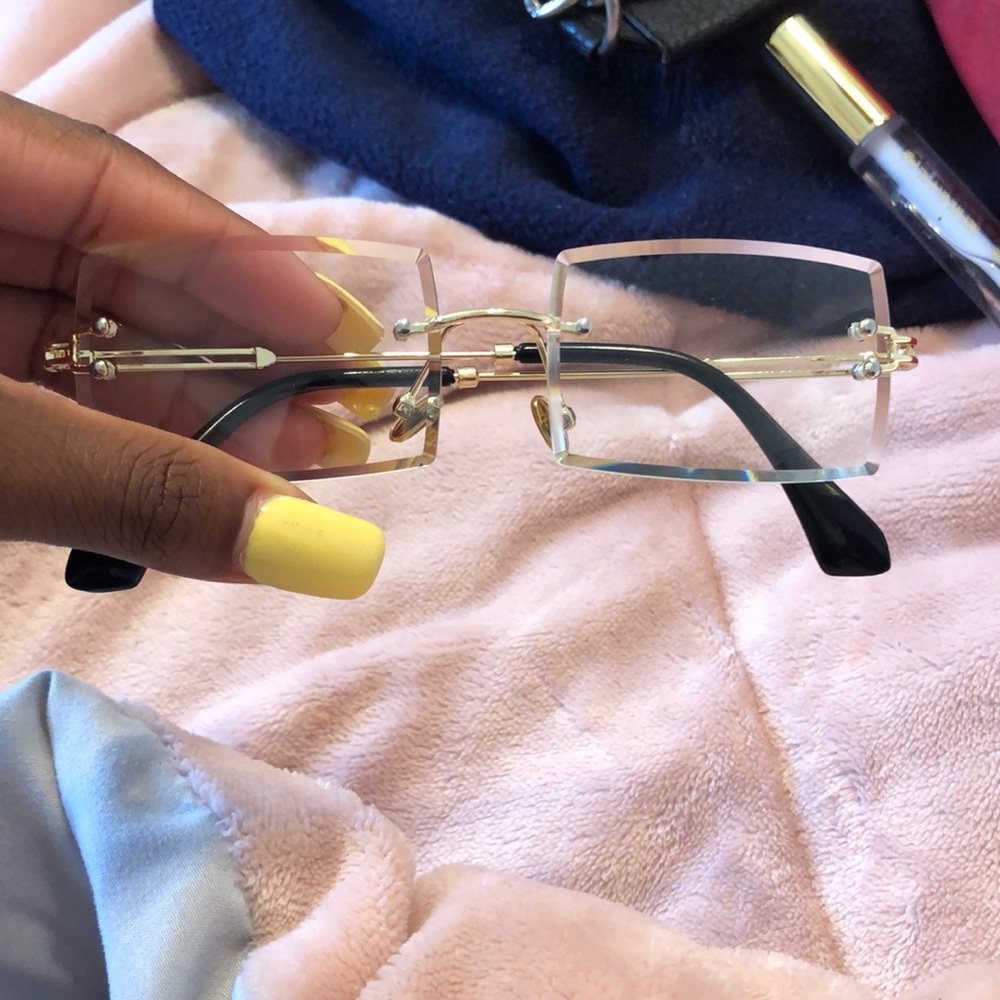 Gold and black glasses they are not prescribed glasses can be worn by anyone
